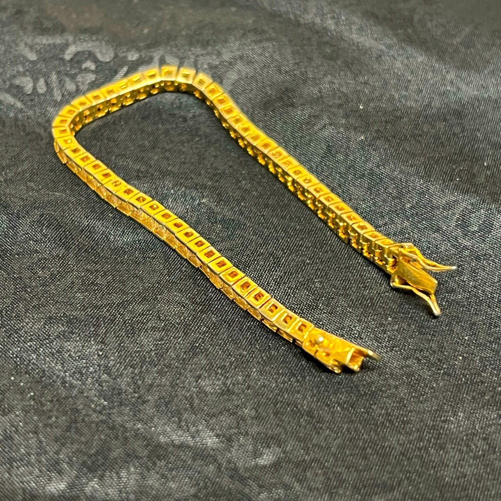 Gold Toned diamond bracelet